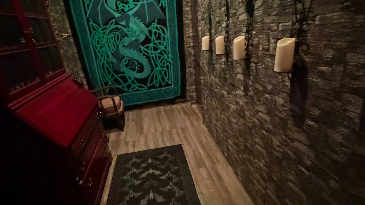 The Vampyr Quest escape room overview with dragon tapestry